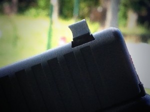 Side view of the CLAW sight on a Glock 19 to show how it earned the name.
